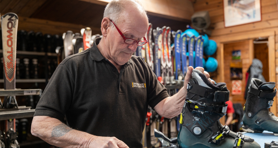 Image of a man getting boots.