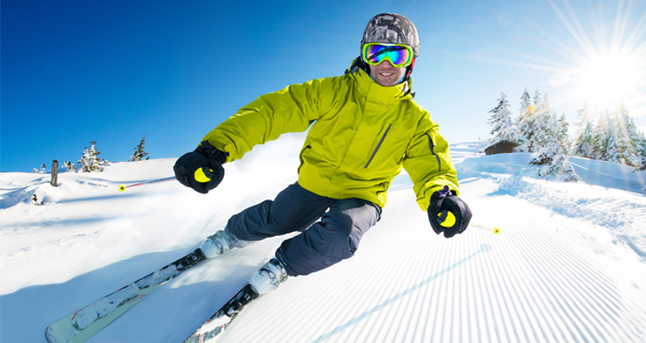 Image of a man skiing down a hill.