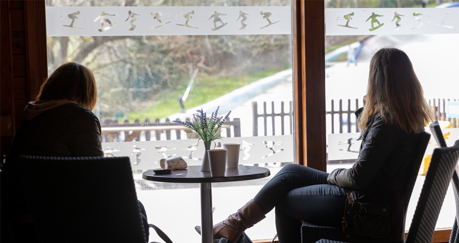 Image of two women sat at a table