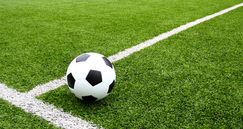 Image of a football and 3G pitch.